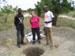 Ada well drilling - Mrs. Graf receives information from Mr. M.D. Segbedzi about the first well being drilled.